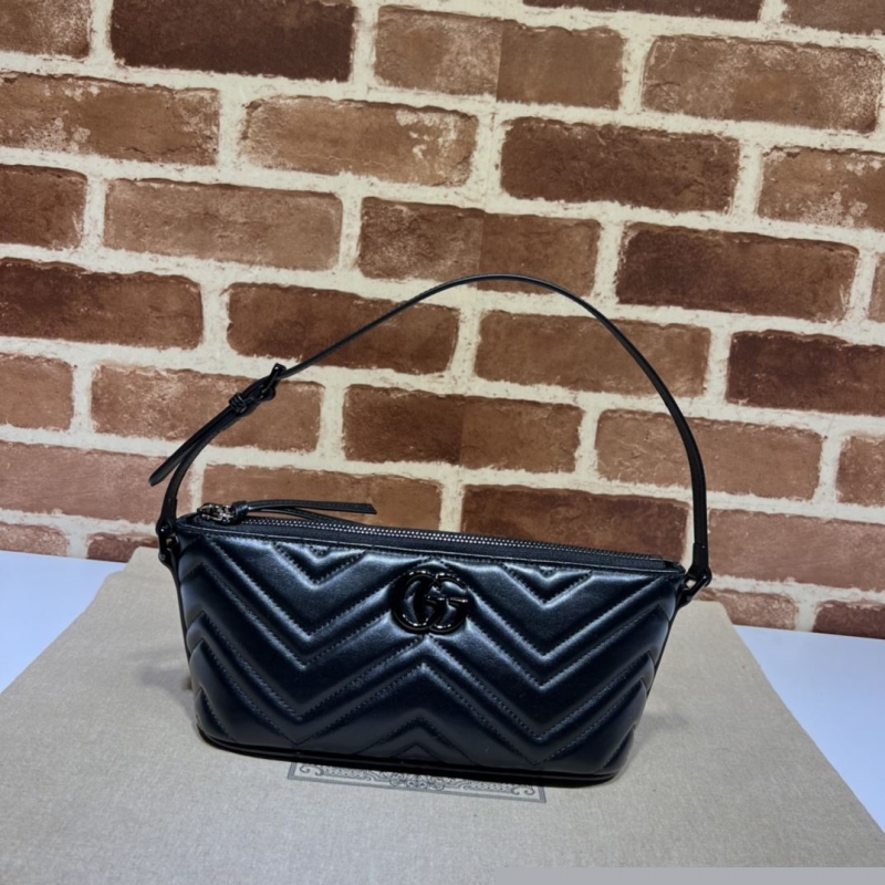 G*u*i top handle bags
